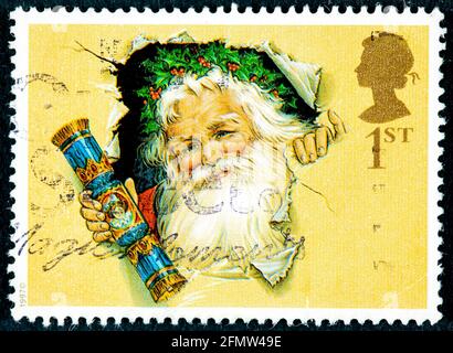 VEREINIGTES KÖNIGREICH - UM 1997: Eine gebrauchte britische Briefmarke, die ein Bild des Weihnachtsmannes um 1997 zeigt. Stockfoto