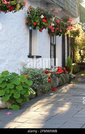 Ferienhäuser im Dorf Hawkshead Cumbria, Großbritannien Stockfoto