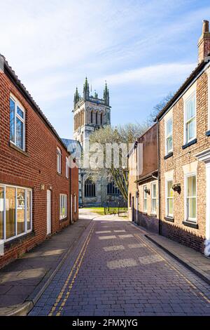 Selby Abbey von Church Lane aus gesehen, Selby, North Yorkshire Großbritannien Stockfoto