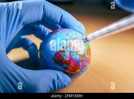 Konzept der Impfstrategie für Global Covid19. Impfstoffe gegen COVID. Stockfoto