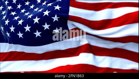 Nahaufnahme der im Wind winkenden amerikanischen Flagge. Selektiver Fokus. Demokratie, Unabhängigkeit und Wahltag. Patriotisches Symbol des amerikanischen Stolzes Stockfoto