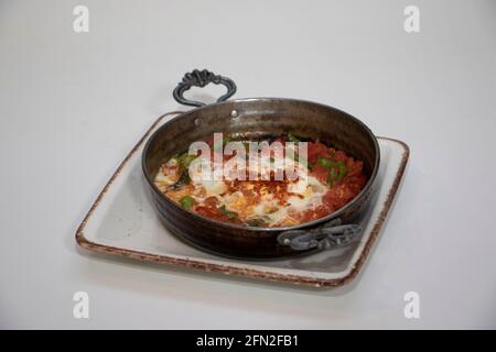 Frühstücksteller mit Ei und domat Stockfoto