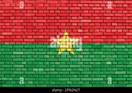 Flagge von Burkina Faso auf Mauer gemalt Stockfoto