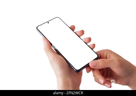 Handymockup in den Händen der Frau aus nächster Nähe. Isolierte Hände und Telefonbildschirm Stockfoto