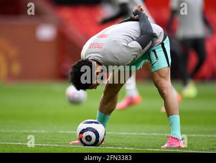 Liverpool-Spieler tragen ein Warm-Up-T-Shirt mit „Jordan“ auf dem Rücken als Hommage an Jordan Banks, der vor kurzem in Blackpool durch Blitzschlag getötet wurde, bevor das Premier League-Spiel in Old Trafford, Manchester, antrat. Bilddatum: Donnerstag, 13. Mai 2021. Stockfoto