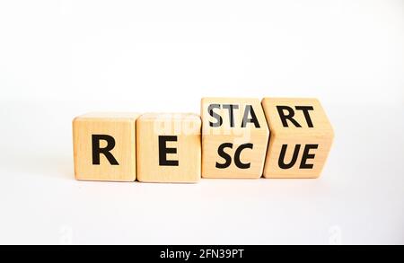 Symbol für Neustart und Rettung. Drehte Würfel und änderte das Wort 'Start' in 'Rescue'. Schöner weißer Hintergrund. Business und Restart - Rettungskonzept. Stockfoto