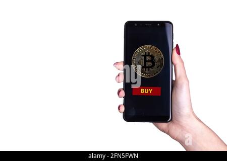 Smartphone mit Bitcoin-Symbol und "kaufen"-Symbol - Handel Kryptowährung Konzept Stockfoto