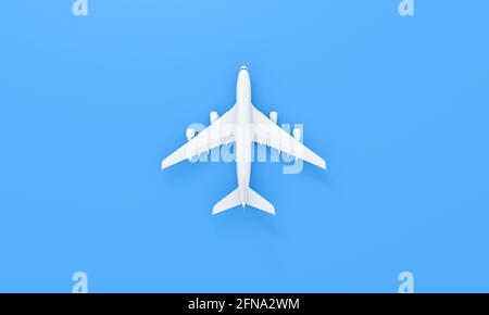 Flaches Lay-Design des Reisekonzepts. Weiße Ebene auf blauem Hintergrund. Reise mit dem Flugzeug Urlaub Sommer Wochenende Meer Abenteuer Reise Ticket Tour Konz Stockfoto
