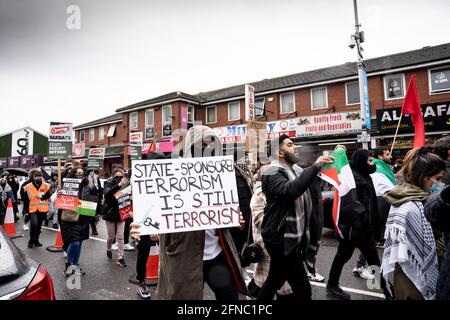 Solidaritätskundgebung und marsch für Palästina. Platt Fields, Rusholme, Manchester, Großbritannien. 15 Mai 2021. Protest in Solidarität mit Palästina, Widerstand gegen die militärische Besetzung Israels und Gedenken an den 73. Jahrestag der Nakba (Katastrophe). © Craig Redmond / craigredmondphotos.co.uk Stockfoto