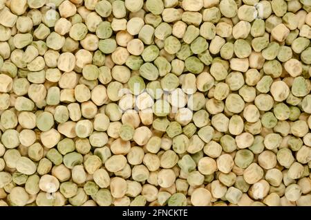 Schneeerbsenkerne, Hintergrund, von oben. Auch chinesische Erbse oder pois mangetout, eine essbare Hülsenerbse mit flachen Hülsen und dünnen Schoten Wände. Stockfoto