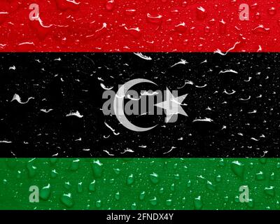 Flagge Libyen mit Regentropfen Stockfoto