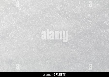 Winterschnee. Schnee Textur Draufsicht auf den Schnee. Textur für Design. Schneeweiße Textur. Schneeflocken. Stockfoto