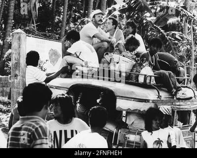 Touristen in einem Minibus in Puerto Galera auf den Philippinen. [Automatisierte Übersetzung] Stockfoto