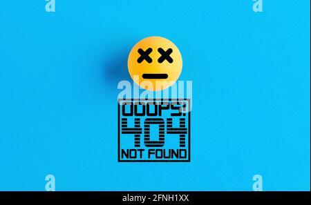 Totgesicht-Emoticon oder Symbol auf einem Ball mit der Fehlermeldung 404 nicht gefunden. Fehlende Webseite, fehlende Verknüpfung oder Dateiprobleme. Stockfoto