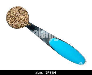 Draufsicht auf Ajowan-Früchte in der Messung Teelöffel Ausschnitt auf Weißer Hintergrund Stockfoto