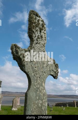 Kilnave Chapel and Cross befindet sich am Westufer des Loch Gruinart, Isle of Islay, Inner Hebrides, Schottland. Stockfoto