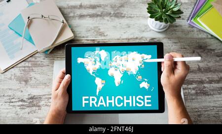 Franchise-Geschäftsmodell und Marketing-Strategiekonzept. Stockfoto