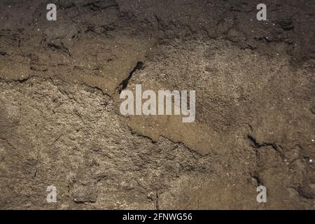 Die Textur des Sandes. Sandsteinbruch. Malerische Textur von Sandsteinen. Stockfoto