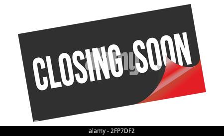 BALD WIRD DER Text auf einem schwarzen roten Sticker geschrieben. Stockfoto