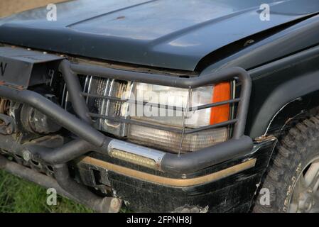 Kopf Licht auf alten Auto Jeep Grand Cherokee Stockfoto