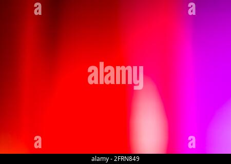 Rote und rosa defokussierte Lichter Hintergrund Stockfoto