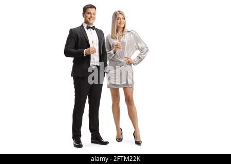 Eleganter junger Mann und Frau mit Gläsern Sekt Isoliert auf weißem Hintergrund Stockfoto