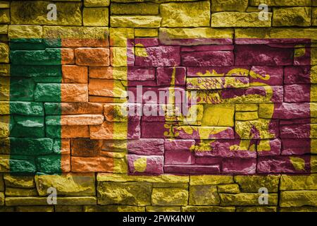 Nationalflagge von Sri Lanka auf Steinmauer Hintergrund.das Konzept der nationalen Stolz und Symbol des Landes. Flagge Banner auf Stein Textur backgrou Stockfoto