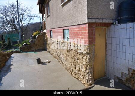 Erweiterung der Hüttenzimmer an Bord aus Beton Stockfoto