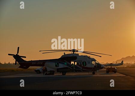 Fluglinie am internationalen Flughafen Dili, bei Sonnenaufgang. Stockfoto