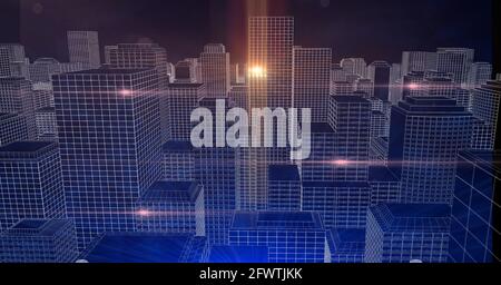 Komposition aus leuchtenden Lichtpunkten über dem Stadtbild bei Nacht Stockfoto