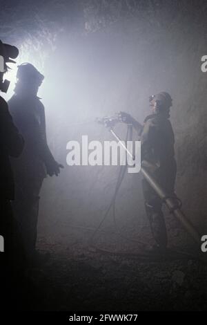 Goldgräber mit Jack-Leg Luft Bohrer Stockfoto