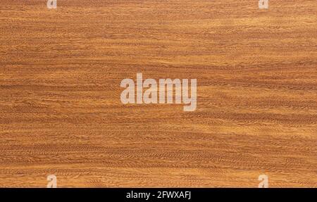 Sheesham Holz Furnier Hintergrund. Hintergrund einer braunen Holzstruktur. Stockfoto