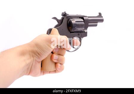 Revolver in der Hand isoliert auf Weiß Stockfoto
