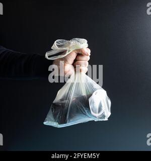 Eine Kamera in einer durchsichtigen Plastiktüte Stockfoto