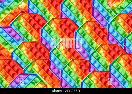 Muster von beliebten Silikon sensorische bunte Anti Stress Pop IT Spielzeug. Pop-Bubble Drücken. Einfacher Dimple. Stockfoto