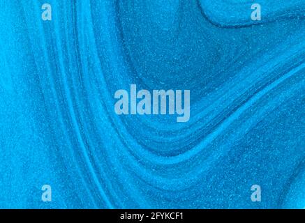 Abstrakte blaue Farbe wirbelt mit Flecken Stockfoto