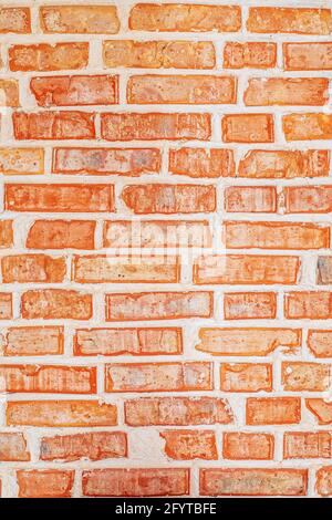 Hell und reich orange geschliffen Loft Backstein Wand Textur Hintergrund Stockfoto