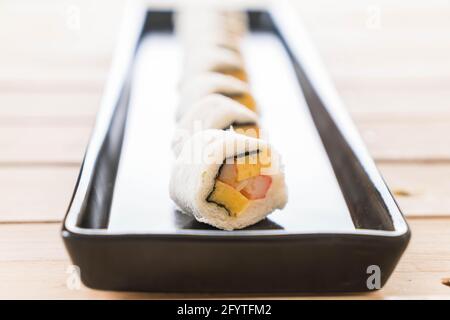 Sushi-Brötchen - Fusion Food Stockfoto