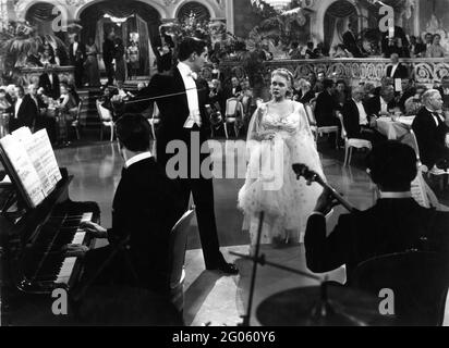 DON AMECHE (am Klavier) TYRONE POWER UND ALICE SAYE IN ALEXANDER'S RAGTIME BAND 1938 regisseur HENRY KING Songs Irving Berlin kostümiert Gwen Wakeling Twentieth Century Fox Stockfoto