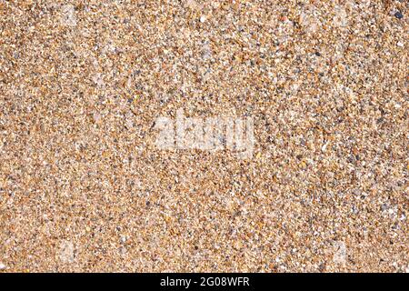 Struktur aus Steinen und Sand am Strand Stockfoto
