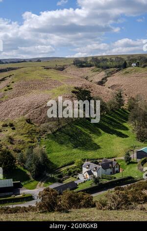 Ein Haus in Gogbatch und Blick auf den Long Mynd, in der Nähe von Church Stretton, Shropshire Stockfoto