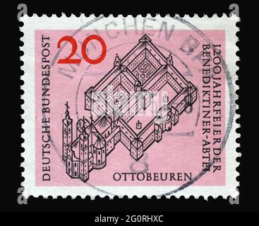 In Deutschland gedruckte Briefmarke zeigt Benediktinerabtei Ottobeuren, 1200-jähriges Jubiläum, um 1964 Stockfoto