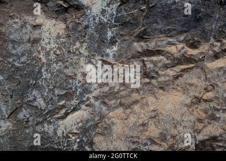 Die Struktur der Höhle oder felsigen Klippen sind schroff mit Vignette Hintergrund Stockfoto