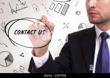 Business, technology, internet and network concept. Young businessman thinks over the steps for successful growth: Contact us Stock Photo