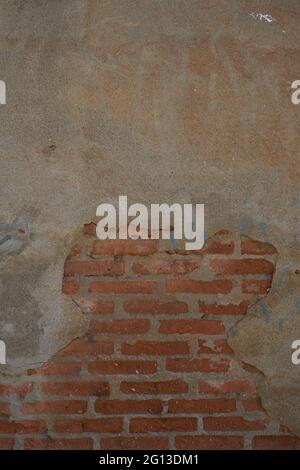 Zement- und Ziegelstruktur. Graue, braune und rote Farbe. Hintergrund für Designs Stockfoto