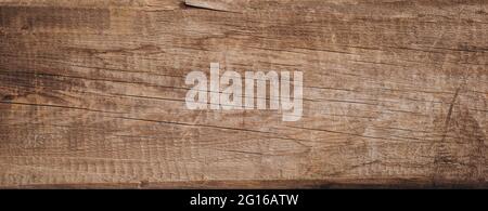 Hintergrund mit Holzstruktur. Braune rustikale Vintage-Kulisse. Alte Planke mit Rissen Stockfoto