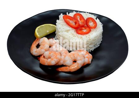 Garnelen mit Reis auf schwarzem Teller, Meeresfrüchte, leckeres Essen, Garnelen Stockfoto
