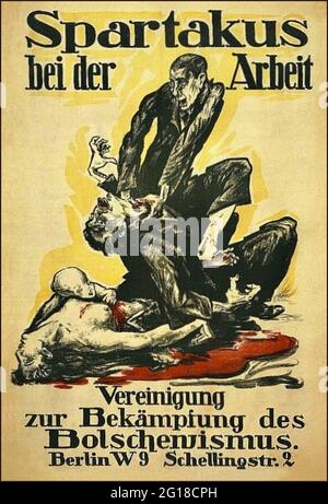 Ein deutsches antikommunistisches Plakat aus dem Jahr 1919, auf dem ein Mann den anderen mit dem Slogan „Spartacus at Work“ würgt. Spartacus war nach dem 1. Weltkrieg eine kommunistische Gruppe in Berlin. Stockfoto