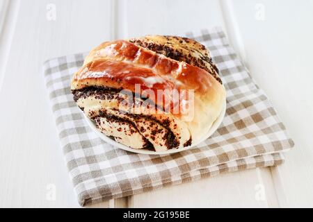 Weihnachten schwedische Mohnbrötchen. Festliches Dessert Stockfoto