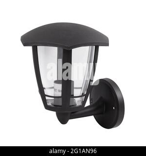 Schwarze Wandleuchte aus Kunststoff isoliert auf weißem Hintergrund. Die schwarze Lampe. Stockfoto